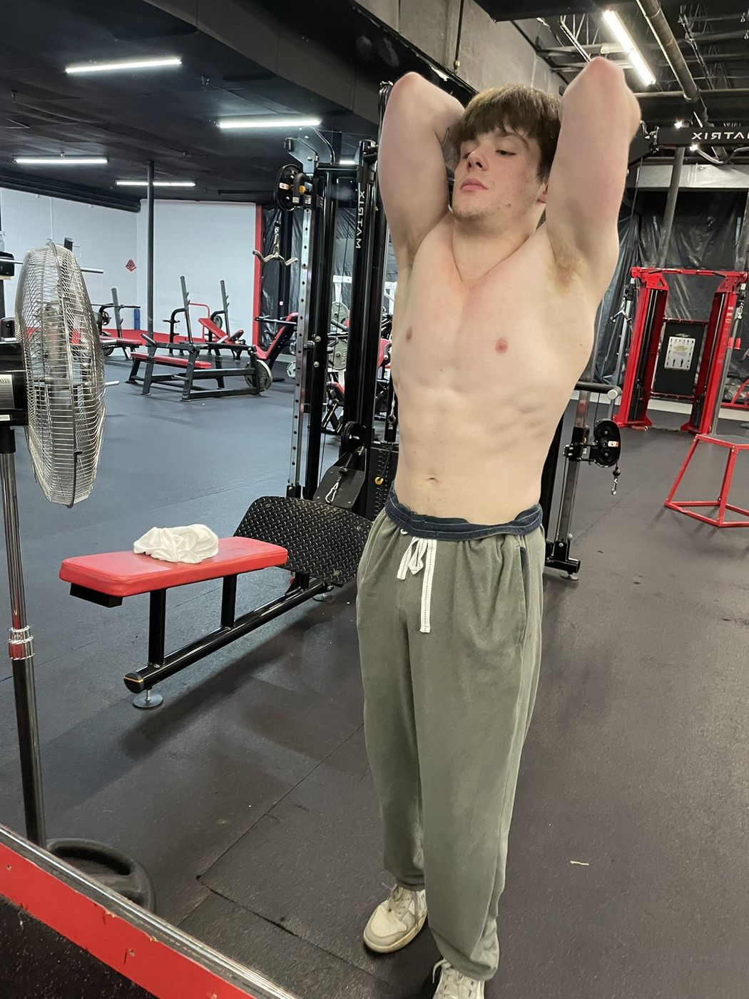 Brad, arms behind his head