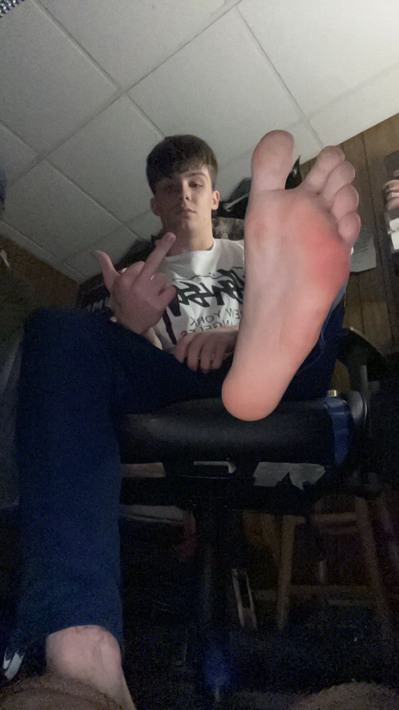 Brad with his foot up to the camera